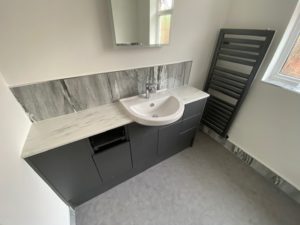 Elliott Kitchens and Bathrooms Testimonial Picture, Customer delighted with new bathroom